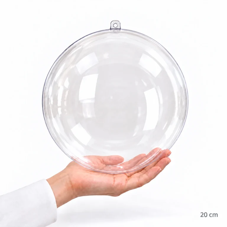 Esfera acrílica transparente de 20 cm sostenida en una mano como referencia de tamaño